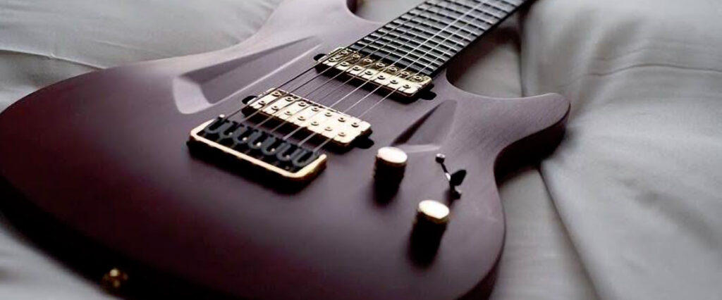 An Aristides guitar beautifully crafted, showcasing the sleek design and innovative technology of the brand.