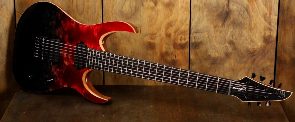 A Mayonnes 7-string guitar, with its sleek design and exceptional craftsmanship, ready to unleash a spectrum of tones.