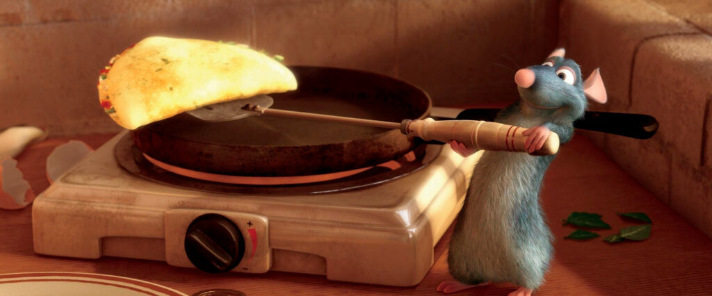 Remy the rat cooking an omelette in 'Ratatouille' movie scene